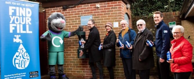A queue of happy people ready to refill their water bottles