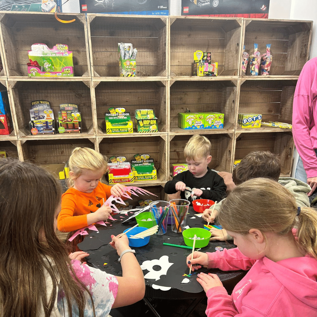 Children taking part in Halloween craft activities at an event in Dorking, Surrey