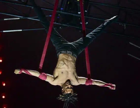 Aerial circus performer at Santus Circus in Dorking, Surrey