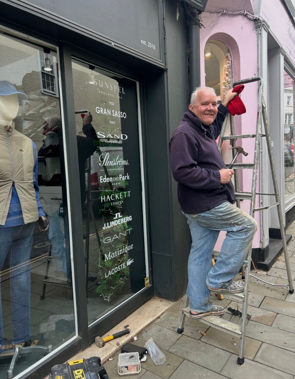 Handyman helping a Dorking business with small repairs